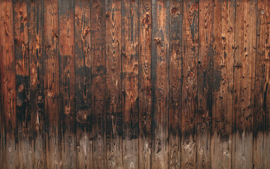 An old wooden vertical wall with a dark, rich brown tone. Wooden textures have endured time and seasons.