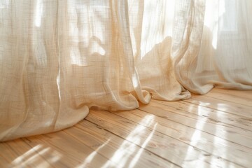 Light filtering through sheer curtains on wooden floor