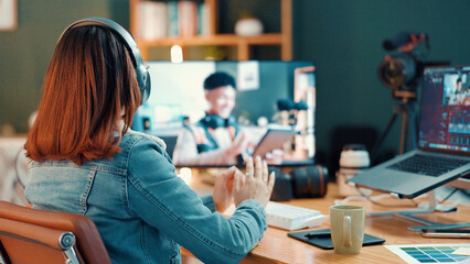 Content creator, headphones and woman editing video on computer screen to broadcast tutorial....