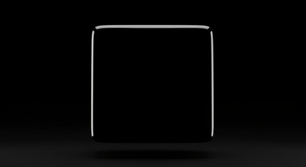 Sleek, black rectangular device, subtly illuminated from below, against a dark background