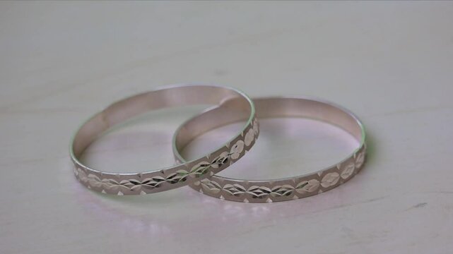 Elegant silver bangles (Churi) from Bangladesh, a timeless beauty ornament for women. Perfect for Pohela Boishakh, Eid, Puja, and weddings, adding traditional charm to any festive attire.