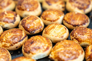 coffee break hotel during conference meeting, corporate revent with tea and coffee catering, decorated catering banquet table with variety of different pastry and bakery, with croissants and cookies