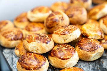 coffee break hotel during conference meeting, corporate revent with tea and coffee catering, decorated catering banquet table with variety of different pastry and bakery, with croissants and cookies