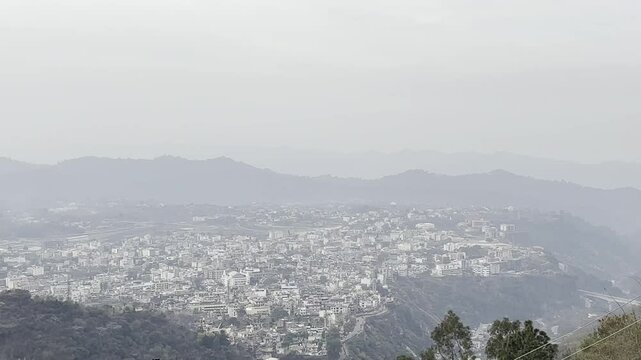 Cinematic footage capturing the spiritual journey and vibrant atmosphere of the Vaishno Devi pilgrimage in Katra, nestled in the scenic Trikuta Mountains of Jammu and Kashmir.