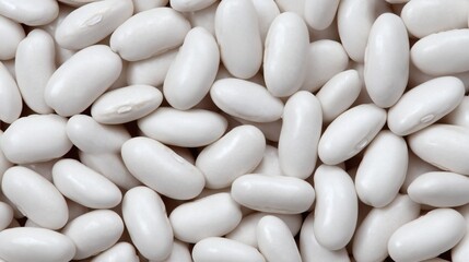 Close-up of smooth white beans, Tightly packed clean legumes, Ideal for food background or agricultural visuals