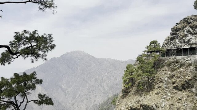 Cinematic footage capturing the spiritual journey and vibrant atmosphere of the Vaishno Devi pilgrimage in Katra, nestled in the scenic Trikuta Mountains of Jammu and Kashmir.