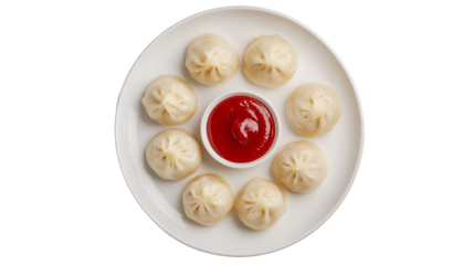 Full frame shot of freshly homemade raw Chinese dumplings arranged in tight rows on a bamboo kitchen plate