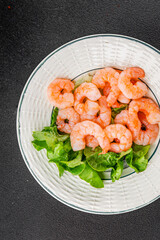 Shrimp salad prawns seafood fresh pescetarian diet gourmet food background on the table rustic food top view copy space keto and paleo diet vegetarian food