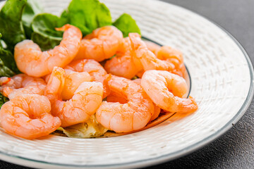 Shrimp salad prawns seafood fresh pescetarian diet gourmet food background on the table rustic food top view copy space keto and paleo diet vegetarian food