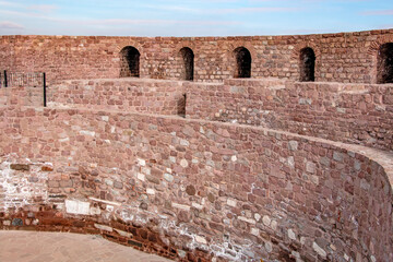 Ancient Stone Fortress Walls: Architectural Detail & History