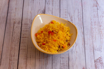 Biryani: The ultimate rice dish, cooked in layers with meat or vegetables, spices, yogurt, and sometimes nuts