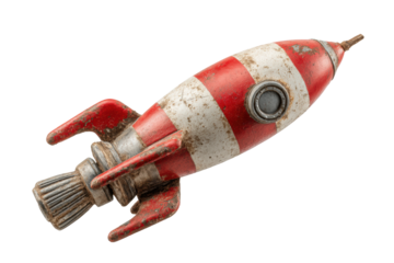 PNG Vintage red and white striped metal toy rocket ship on black background