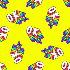 Seamless pattern with rainbow-colored word patches “OK” on yellow background. Vector wallpaper. Quirky cartoon comic style of 80-90s. 