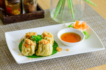 Traditional Steamed Shumai Dumplings with Dipping Sauce