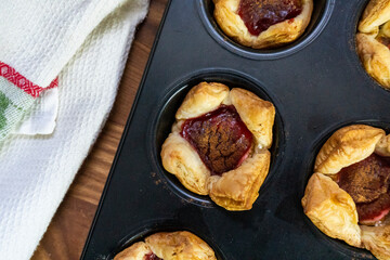 Sugar Plum Cheese Danish. Puff pastry with plum jam and cinnamon. Dessert. Food