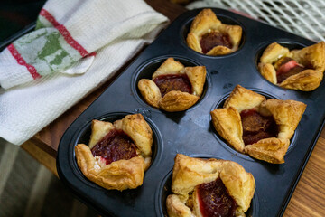 Sugar Plum Cheese Danish. Puff pastry with plum jam and cinnamon. Dessert. Food