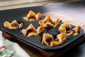 Sugar Plum Cheese Danish. Puff pastry with plum jam and cinnamon. Dessert. Food