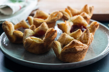 Sugar Plum Cheese Danish. Puff pastry with plum jam and cinnamon. Dessert. Food