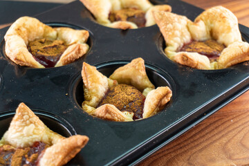 Sugar Plum Cheese Danish. Puff pastry with plum jam and cinnamon. Dessert. Food