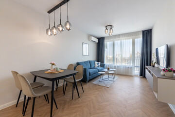 Modern Apartment Interior. Modern Living Room Interior with Natural Light, Elegant Furniture, and Cozy Atmosphere. Ideal for Real Estate, Home Design, and Lifestyle Concepts