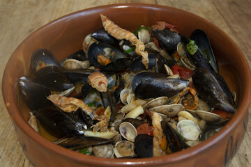 Seafood Medley in Rustic Clay Bowl