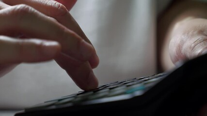 An economist in the office calculates profit on a calculator.
Mathematical calculations and algorithms.
A banker presses the calculator buttons to calculate income.
Using a calculator