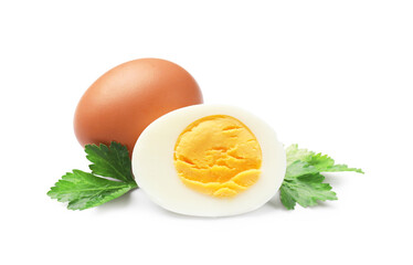 Boiled eggs and parsley on white background