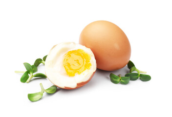 Soft boiled eggs with microgreens on white background