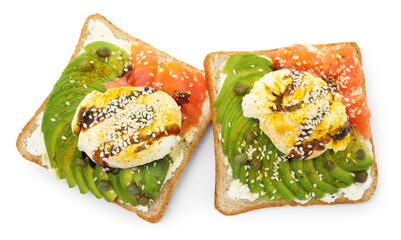 Delicious sandwiches with avocado, poached egg and salmon isolated on white, top view