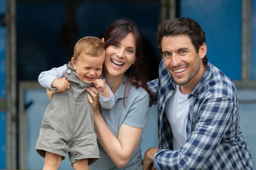 happy family having fun together in a farm