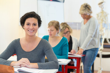 portrait of happy woman in classroom