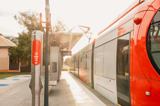 Tap on and tap off sign at light rail stop