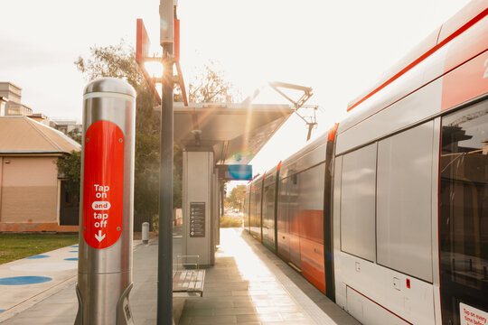 Tap on and tap off sign at light rail stop