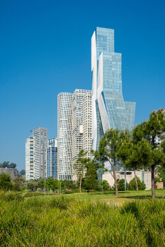 Bicycle path and green spaces at Parque La Mexicana in Santa Fe Mexico City blending nature and modern architecture