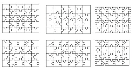 Collection of different jigsaw puzzle arrangements isolated on white background