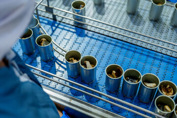 Fish processing industry utilizes advanced techniques to ensure quality and efficiency in canning...