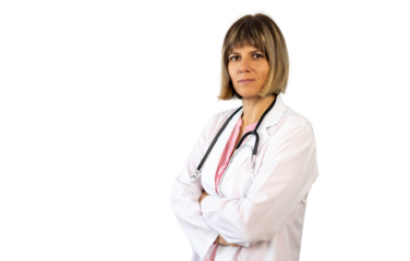 Confident female doctor posing with crossed arms on transparent background
