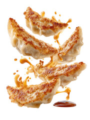 Crispy gyoza dumplings flying apart with savory dipping sauce splash, showcasing delicious Asian cuisine and dynamic motion, perfect for food concepts and culinary inspiration