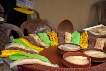 Traditional Bengali Pitha Sweets with Rice Flour, Coconut, and Nalen Gur