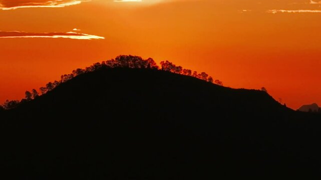 Big sun close-up rising at mountain. Beautiful nature video landscape.