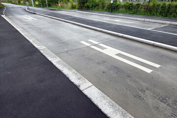 Urban Road Infrastructure with Bus Lane and Pedestrian Symbols for Traffic Management