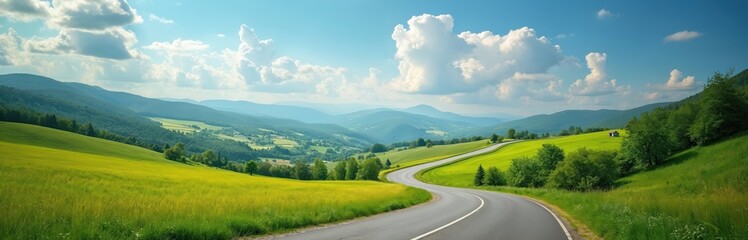 Scenic winding road stretches ahead through verdant hills and meadows under clear blue sky with puffy white clouds. Perfect for travel, adventure, journey, road trip, vacation.
