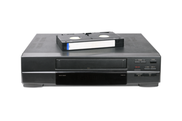 Classic VCR with cassette lying on top isolated on white background.