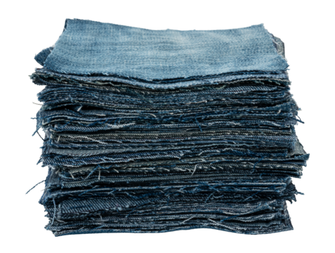 Stack of different pieces jeans on a white background. Denim background texture for design. Canvas denim texture.