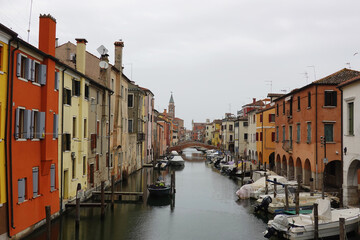 Obraz premium Old canals and streets in Chioggia, Italy