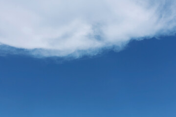Bright blue sky and white clouds