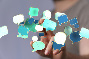 Abstract image of interconnected speech bubbles, symbolizing global communication and networking.