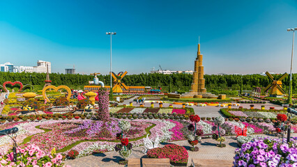 Dubai miracle garden timelapse with over 45 million flowers in a sunny day, United Arab Emirates