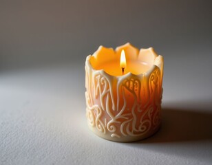 Illuminated Ornate Candle A Burning Decorative Candle with Intricate Design