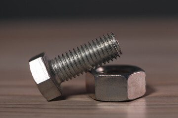 metal screw and bolt on the table